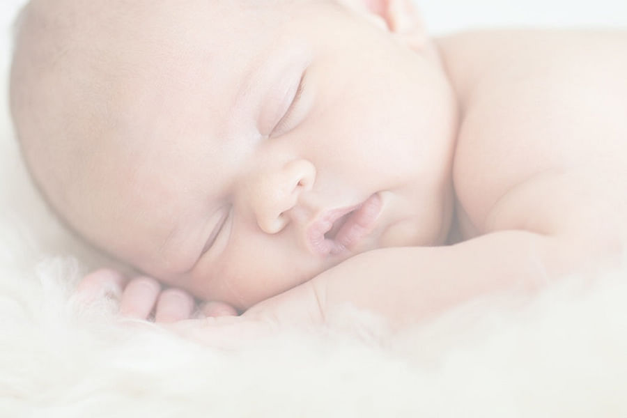 baby sleeping on back