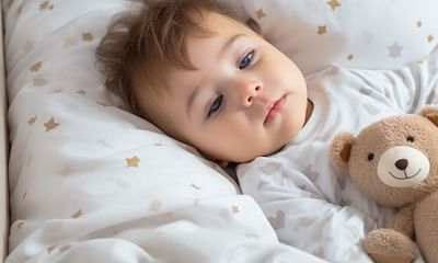Is it safe to put my 11-month-old baby in a toddler bed?